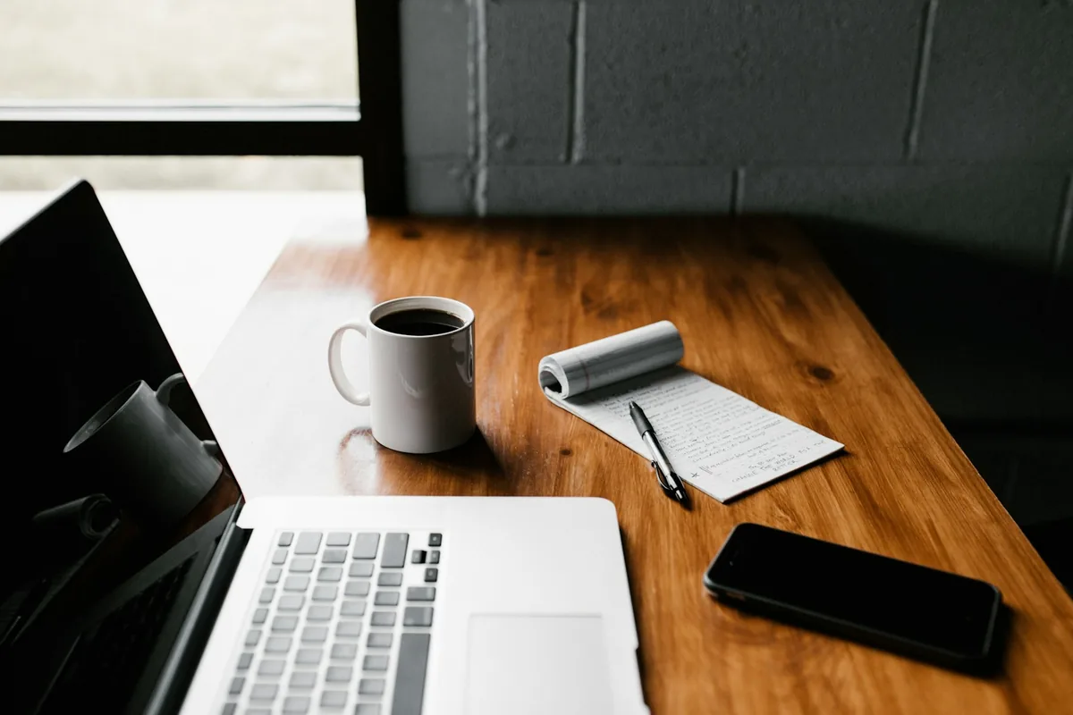 Laptop and notebook for content planning
