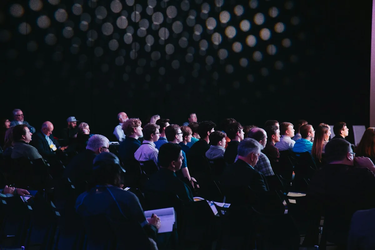 Marketing strategy discussion at a professional event